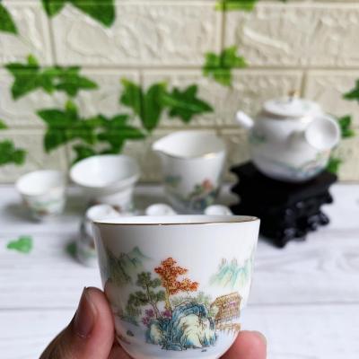 Bộ Ấm Chén Sơn Thủy Tay Tẩu Viền Vàng